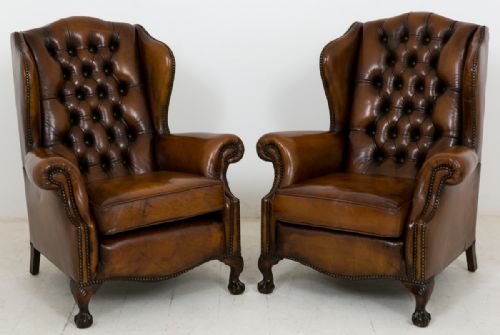Pair of Leather Deep Buttoned Wing Chairs