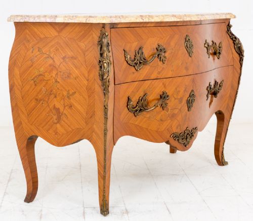 A Superb French Walnut Commode