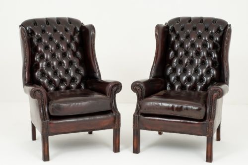 Pair of Deep Buttoned Leather Wing Chairs