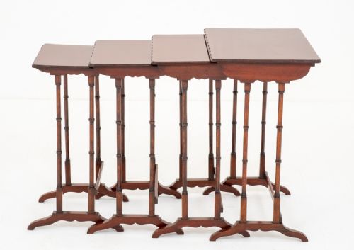 Nest of 4 Mahogany Tables