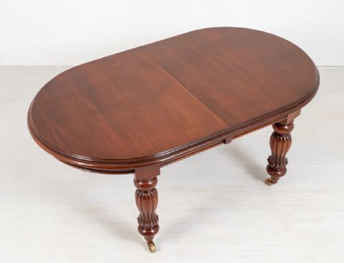 fig 1. Victorian Style Mahogany Bow End Extending Dining Table