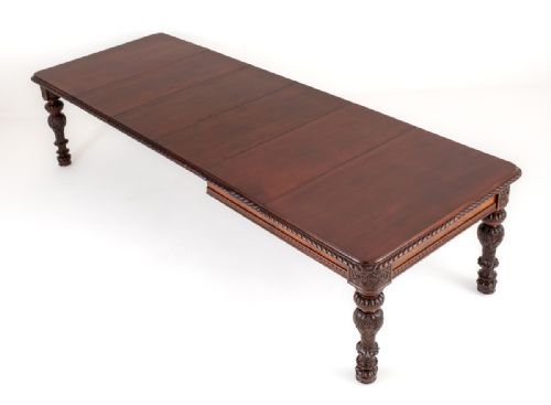 An Amazing Victorian 4 Leaf Mahogany Carved Dining Table