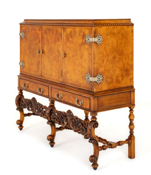 A Stunning Walnut Carolean Style Drinks Cabinet