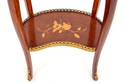 fig 1. A French kidney-shaped mahogany occasional table featuring a pierced brass top gallery, single drawer, lower marquetry tier, and slender legs with metal mounts.