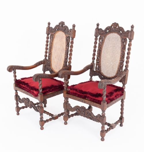 A Pair of Cromwellian Style Oak Arm Chairs