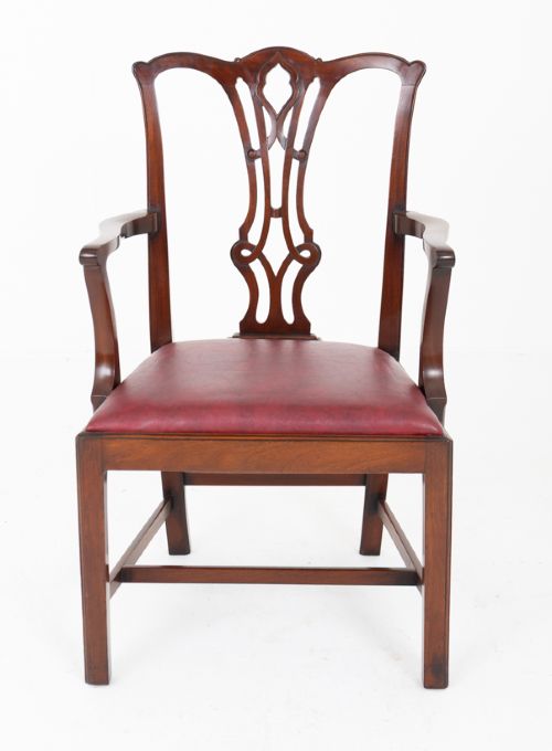 fig 2. A set of ten mahogany Chippendale style dining chairs with carved pierced back splats and red upholstered seats.