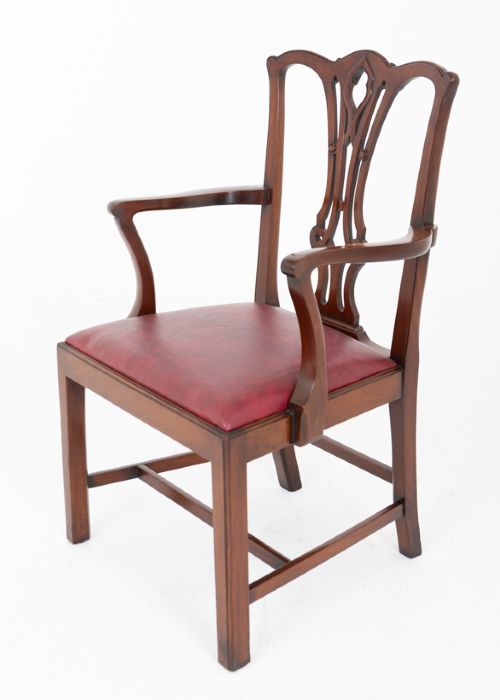 fig 3. A set of ten mahogany Chippendale style dining chairs with carved pierced back splats and red upholstered seats.