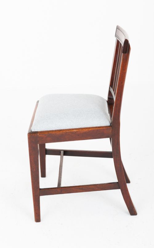 Set of four Georgian mahogany dining chairs with rectangular bar backs, vertical splats, and light grey upholstered seats. View IV