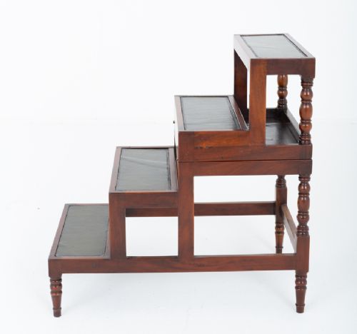 A four-tier mahogany library step structure featuring dark leather-lined treads and turned wooden spindle legs. View VI