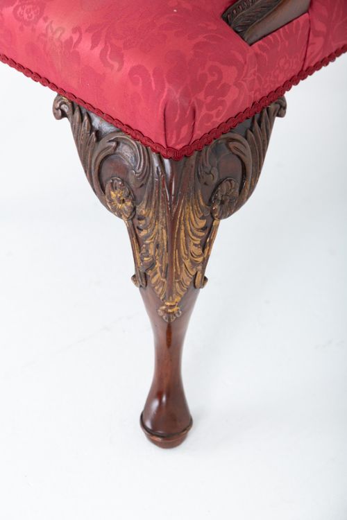 A Chippendale style armchair upholstered in red damask fabric with carved mahogany cabriole legs and parcel-gilt detailing. View III