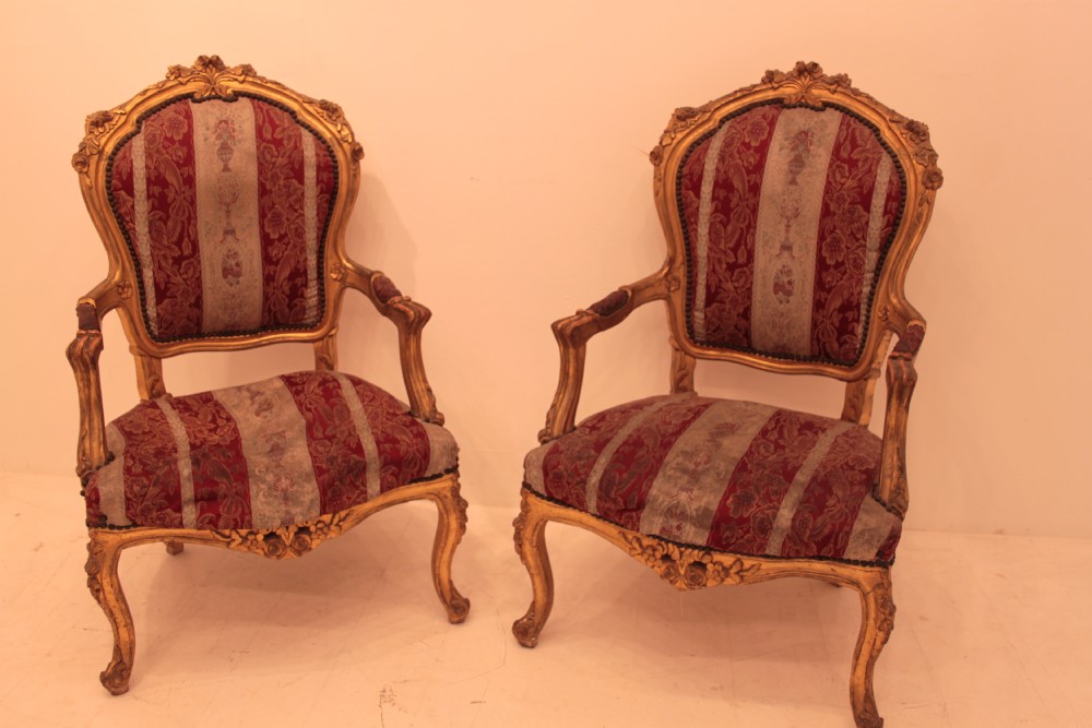 Pair of Louis XVI Style Carved Gilt wood Chairs
