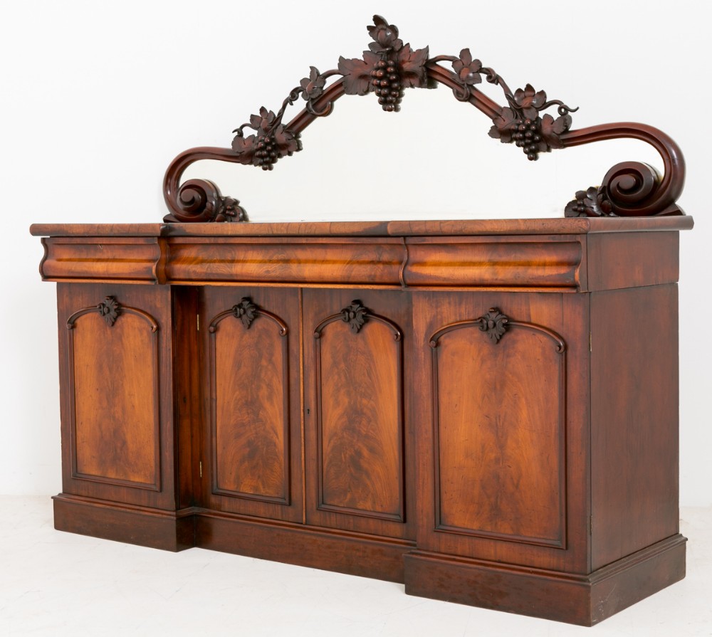 High Victorian Mahogany Carved inverted Sideboard