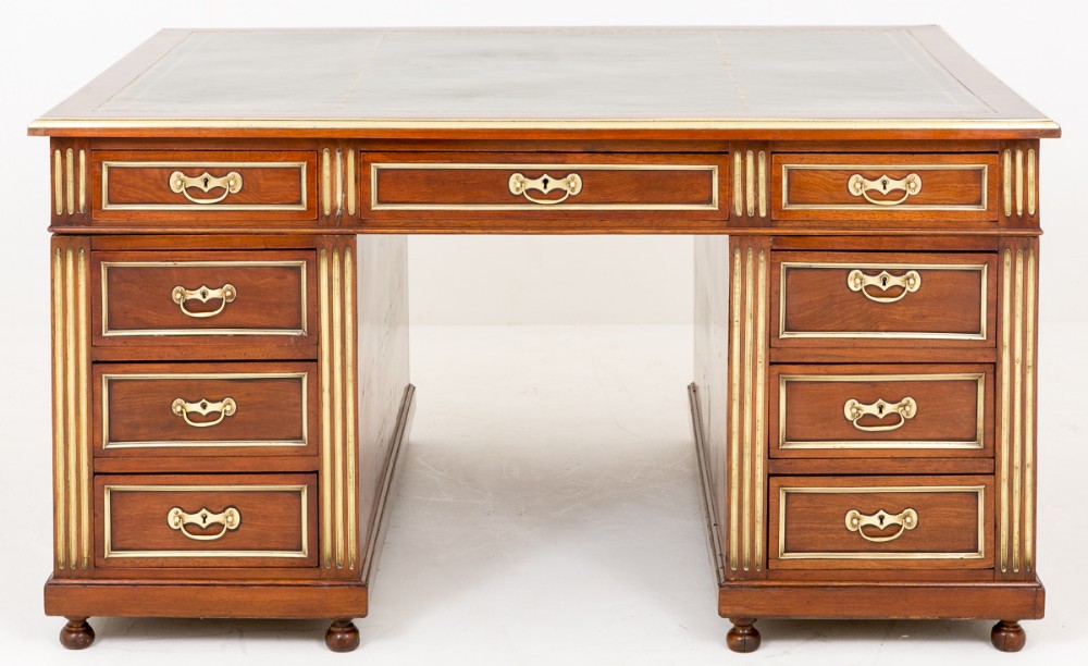 A Superb French Mahogany and Gilt 18 Drawer partners Desk