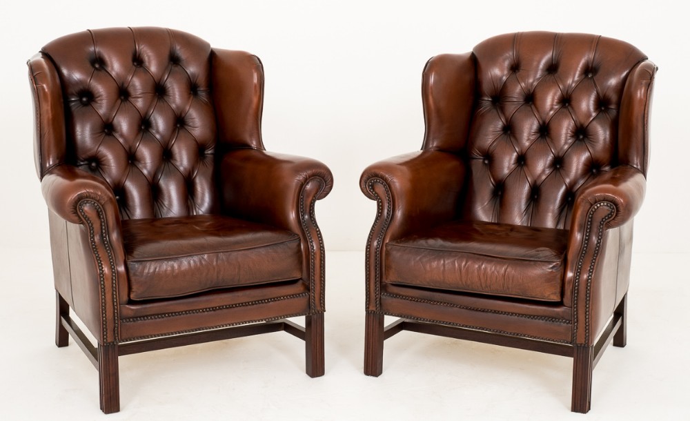 Pair of Deep Buttoned Leather Wing Chairs
