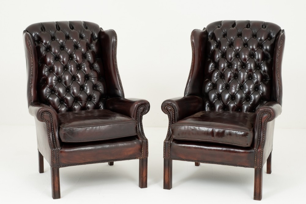 Pair of Deep Buttoned Leather Wing Chairs