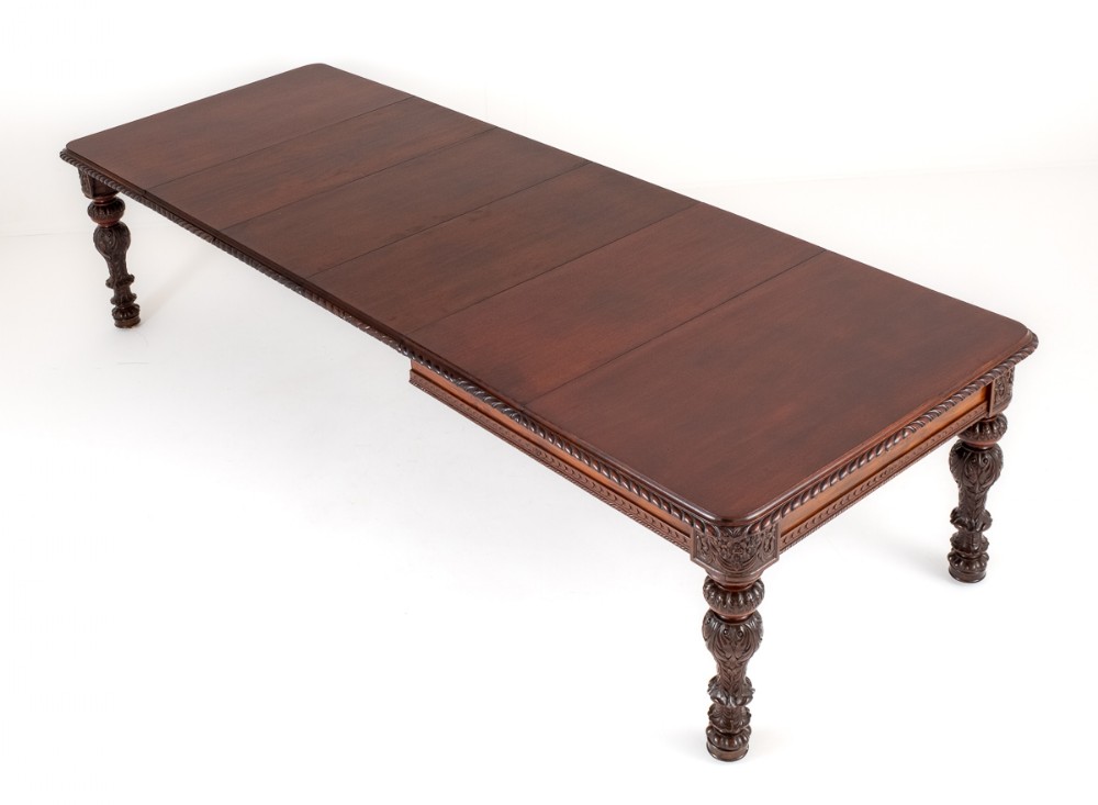 An Amazing Victorian 4 Leaf Mahogany Carved Dining Table