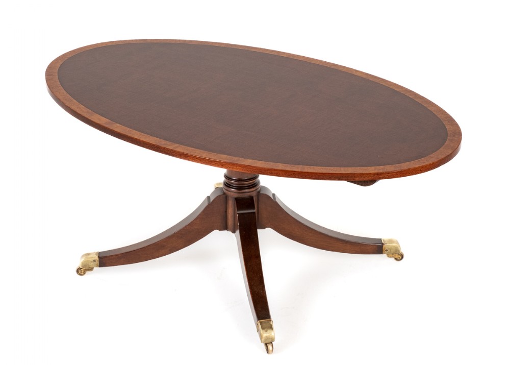 Mahogany Regency revival oval coffee table