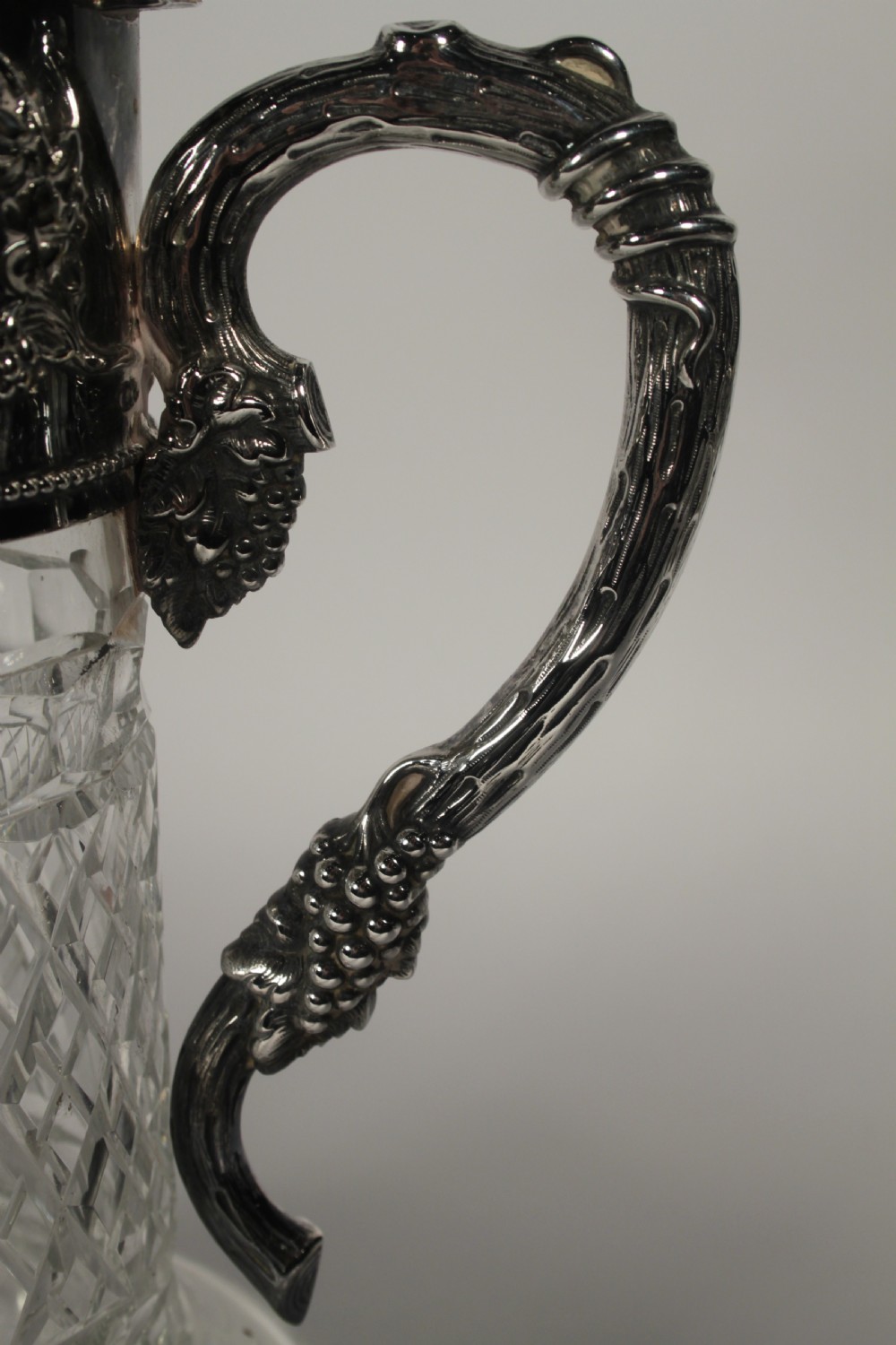 A Pair of Cut Glass and Silver Plate Portuguese Claret Jugs View III