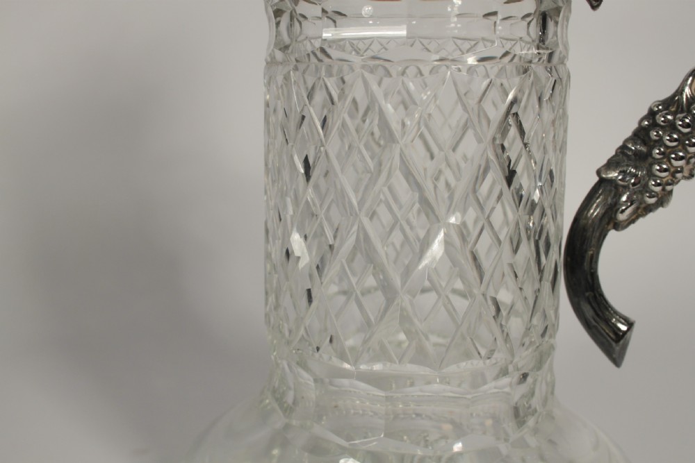 A Pair of Cut Glass and Silver Plate Portuguese Claret Jugs View V