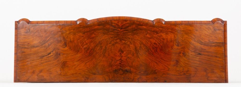 A Victorian burr walnut credenza featuring three arched glazed doors, intricate gilt ormolu mounts, and a solid plinth base. View X
