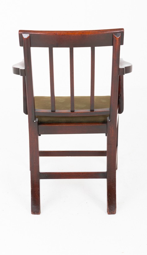 A Georgian mahogany armchair with a vertical slatted backrest, curved arms, and an olive green velvet upholstered seat. View IV
