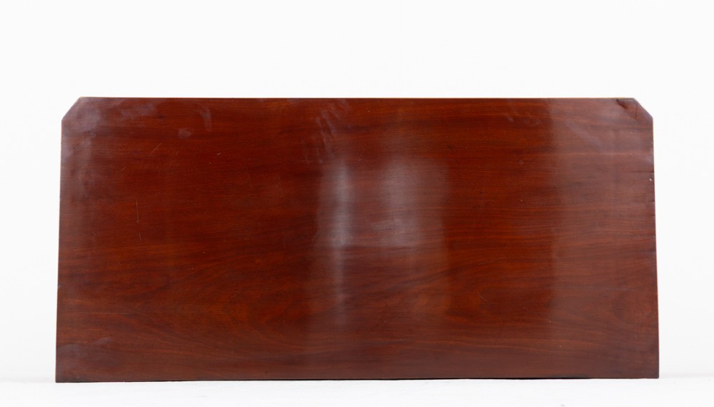 A Regency mahogany chest of four graduated drawers featuring brass oval backplate handles, reeded side pilasters, and splayed bracket feet. View XI