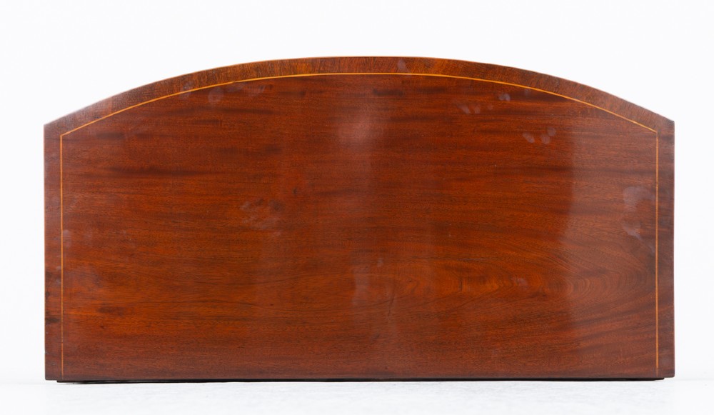 An antique Georgian bow-fronted mahogany sideboard with drawers featuring brass oval drop handles and tapered square legs. View X