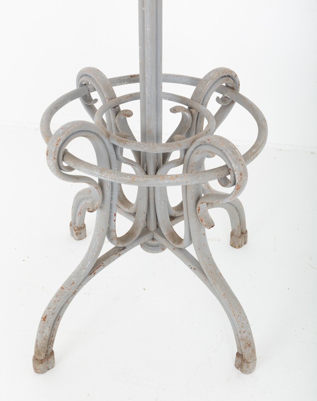 A tall grey painted bentwood hallstand featuring upper scrolled hooks, a central turned finial, and an integrated lower umbrella ring base. View VII