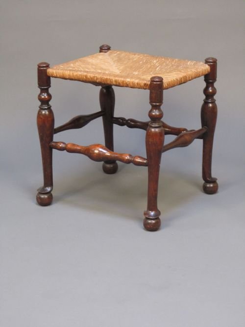 A 19thc Oak Rush Seated Stool on Pad & Ball Feet.