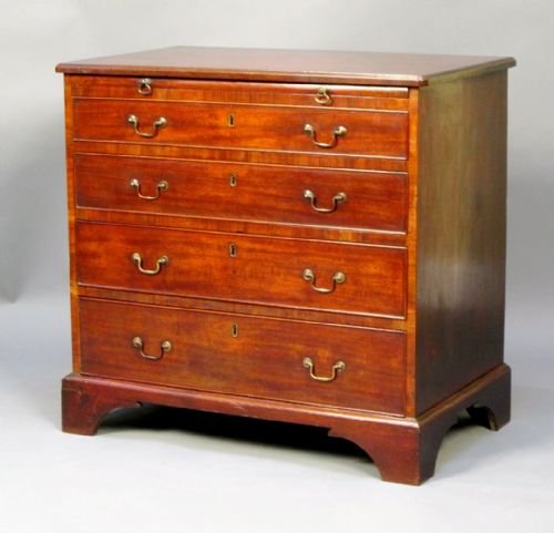 A Late 18thc. Mahogany Chest of Drawers with Brushing Slide & Original Handles & Bracket Feet.