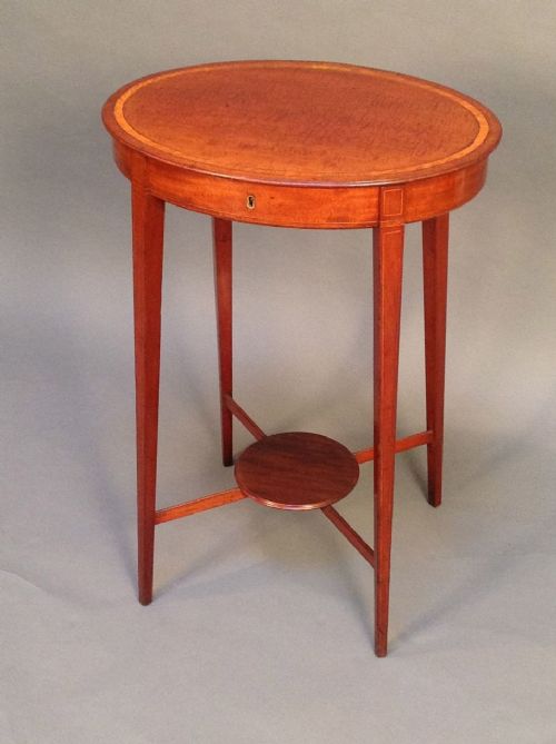 19thc. Mahogany Oval Work Table on Square
tapered Legs