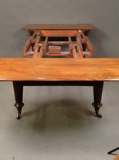 An Excellent Early 19thc. Mahogany  12/14 Seater Pull Out
dining Table