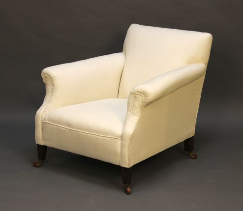 An Edwardian Low Armchair