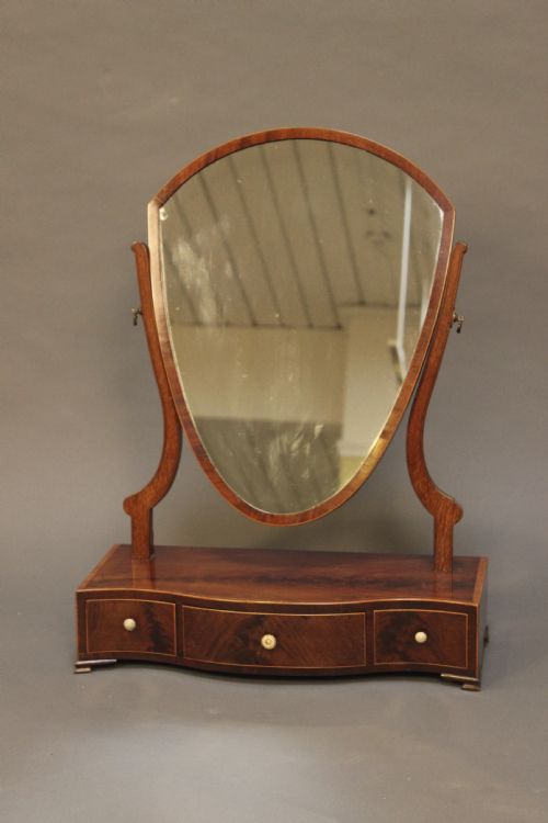 A Georgian Mahogany Shield Shaped Dressing Mirror