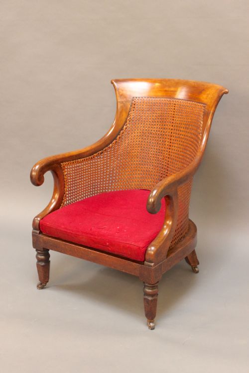 A Regency Walnut Bergere Chair