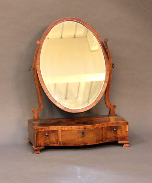 A Regency 3 Drawer Oval Dressing Mirror
