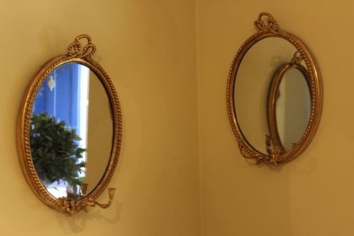 Pair of 19thc. Gilded Oval Mirrors With
candle Holders