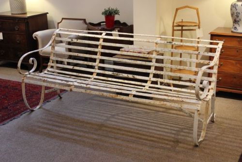 Victorian Wrought Iron Bench with Aged White Paint.