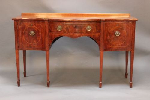 Late Georgian Mahogany Serpentine Sideboard