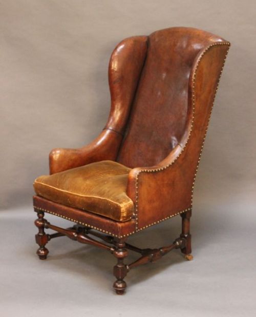 Leather Wing Armchair with Brass Studs on Turned Legs