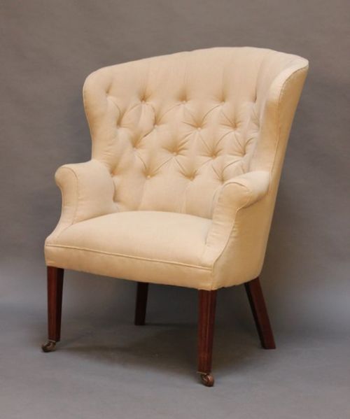 Mahogany Upholstered Scoop Shaped Button Backed Wing Armchair