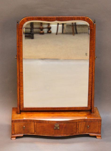 An 18thc. Serpentine Shaped Box Mirror