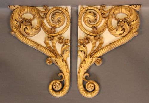 A Pair of 19thc. Gilt Wood Corner Brackets