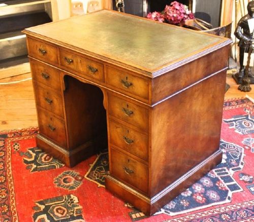 A Late 19thc. Walnut Knee Hole Desk