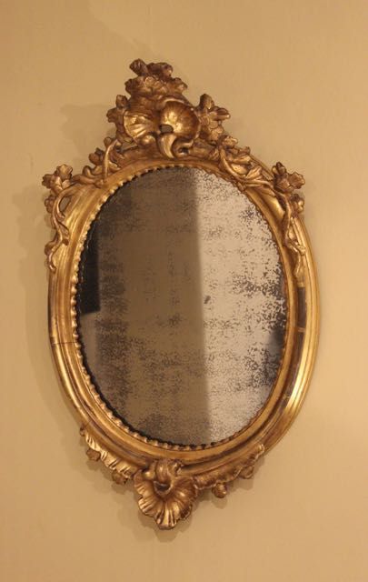 A Late 18thc. Gilt Wood Oval Wall Mirror