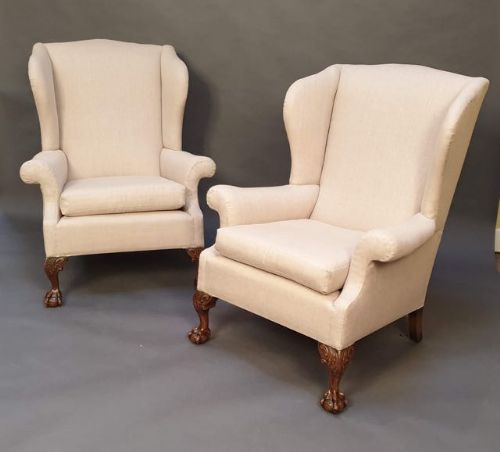 A Pair of 19thc. Walnut Claw & Ball Upholstered Wing Armchairs