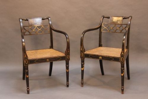 A Pair of Regency Ebonised & Painted Bergere Chairs