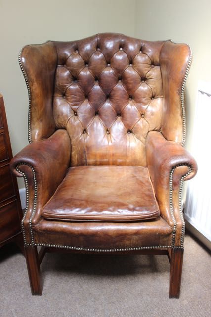 A Good 19thc. Leather Wing Armchair