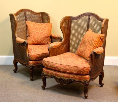 A Pair of 19thc. Walnut Wing Armchairs