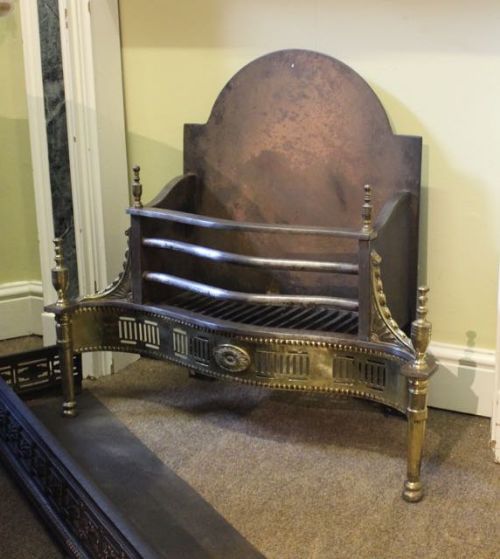 An Edwardian Serpentine Fire Grate